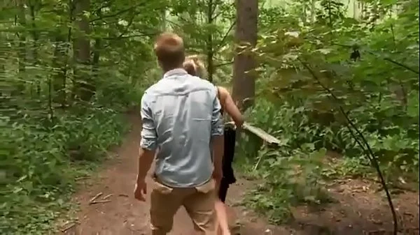 Young guy fucks an adult lady with beautiful boobs right in the forest