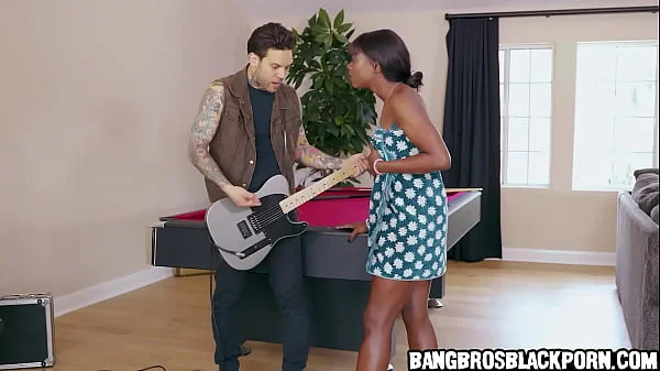 Ebony stepsister asks her stepbrother to stop playing guitar because she's masturbating - interracial porn