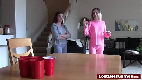 Strip Pong with the loser licking the winner's pussy