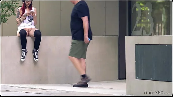 Brunette girl with skateboard flashing in public