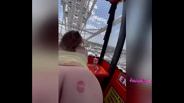 Slut get fucks in public on the Ferris wheel